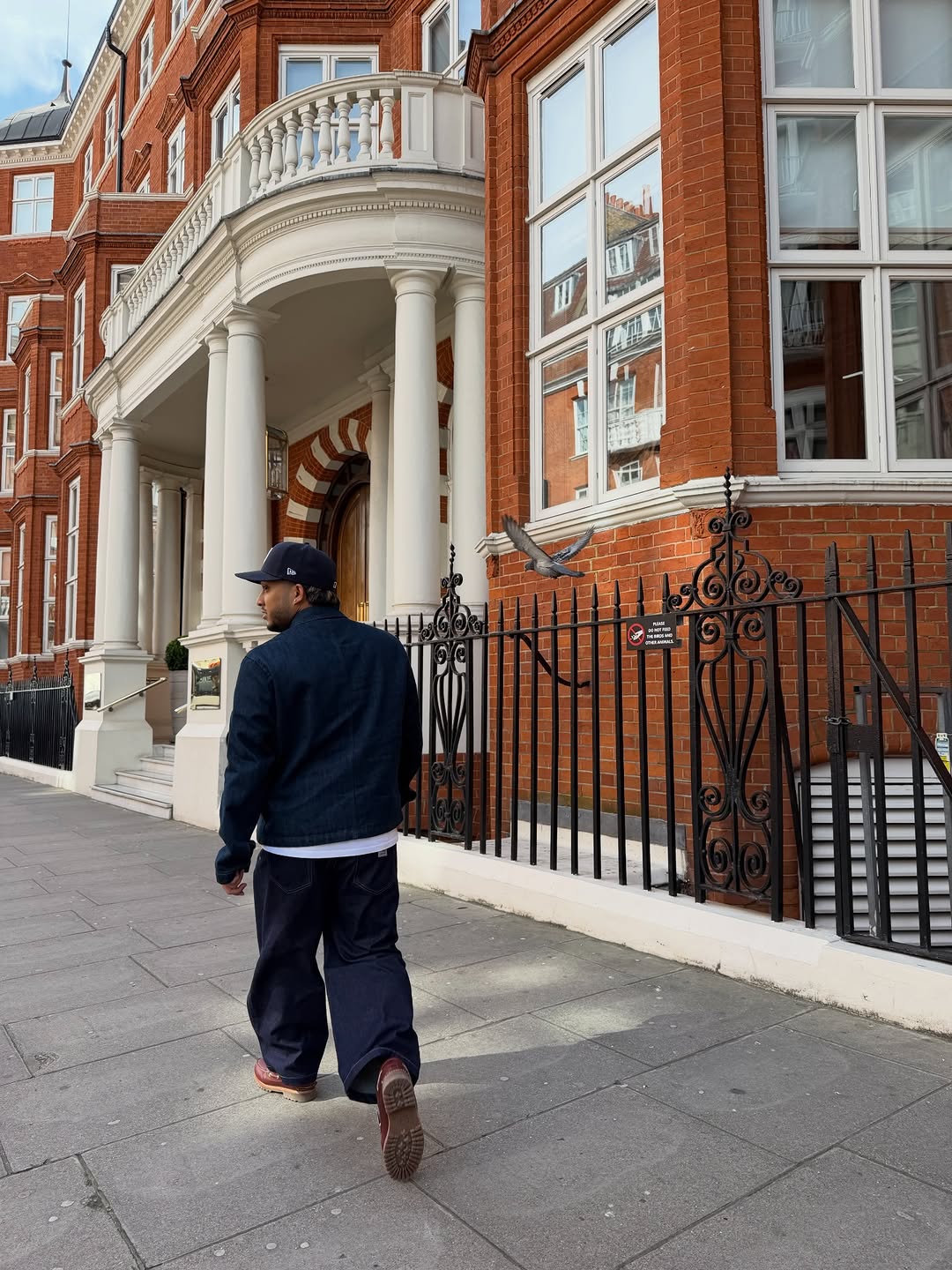 Textured haircut with bird on shoulder
